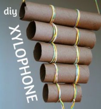 A homemade xylophone made out of toilet paper rolls.