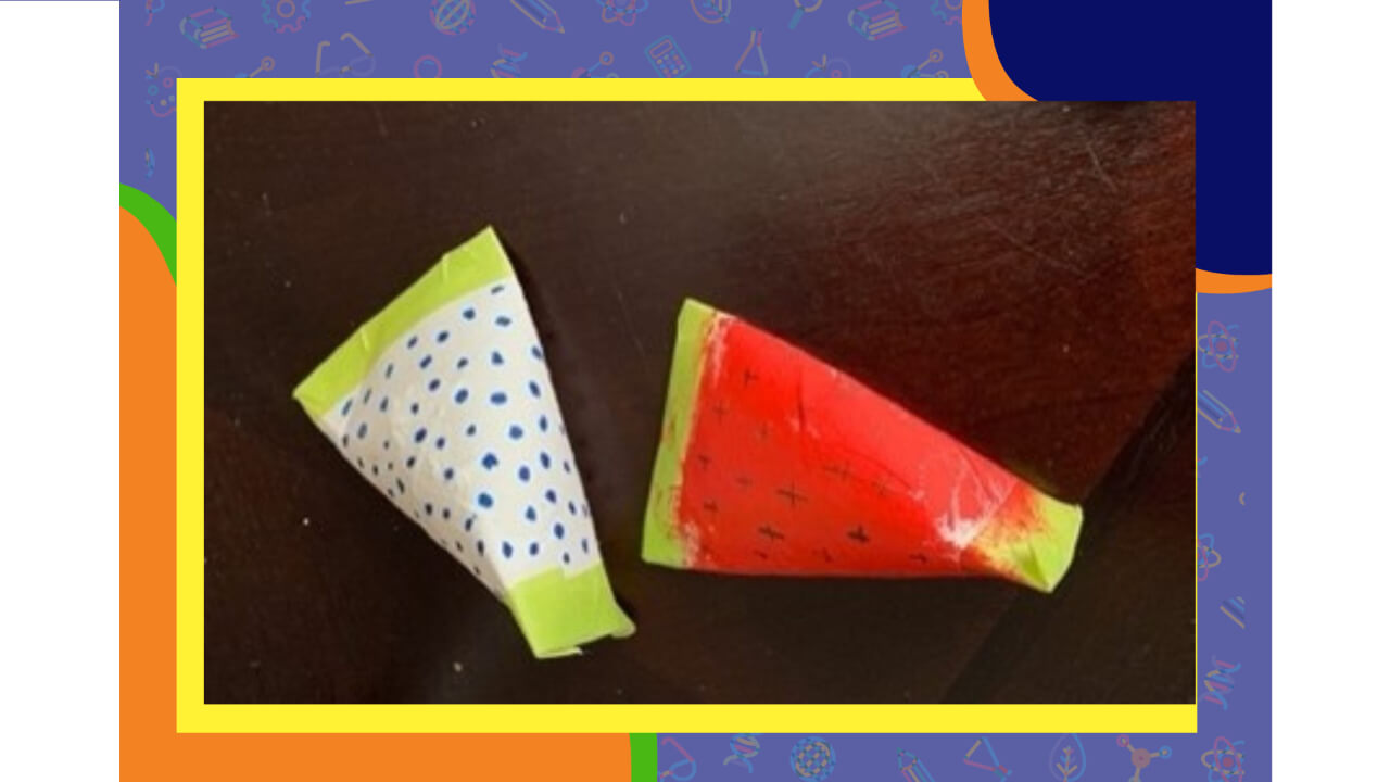 Two paper cones with different designs on them.