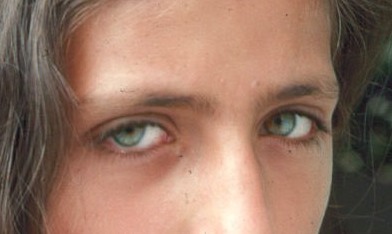 Girl with large green eyes